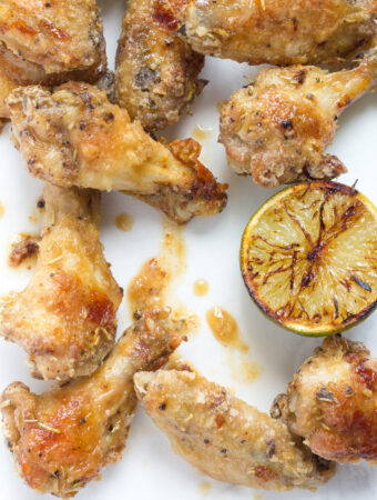 Oven baked chicken wings with burnt lime butter